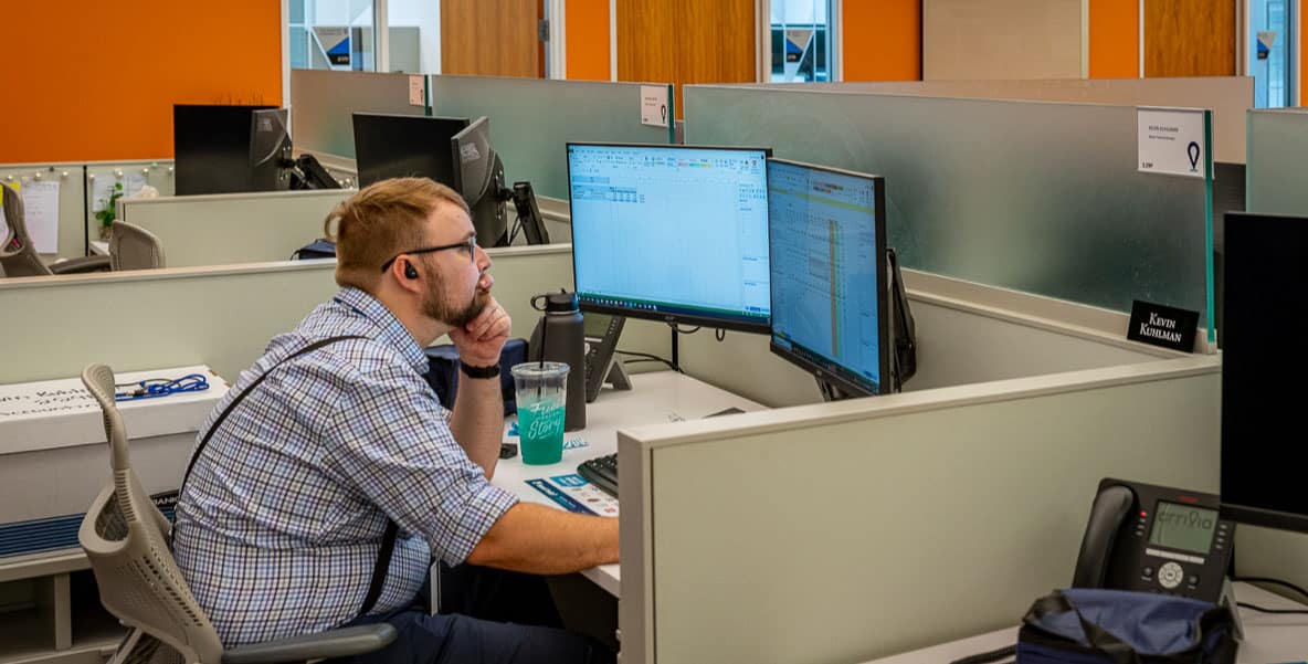 an arrivia employee focuses at his desk in our Asia office